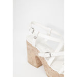 Guess Beige Leather High Heel with cork-effect platform and adjustable straps for stable, elegant wear.