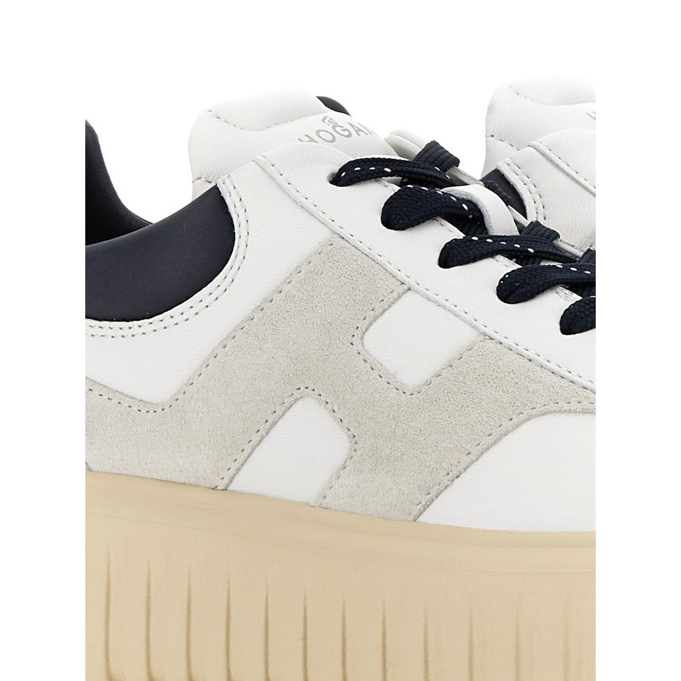 Hogan Pre Sneakers Hogan H-Stripes with white lace-up, logo patch on side, branded insole, and rubber sole. Stylish leather footwear.