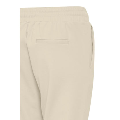 ICHI Beige Polyester Pants featuring elastic waistband and clean design for a modern slim fit.