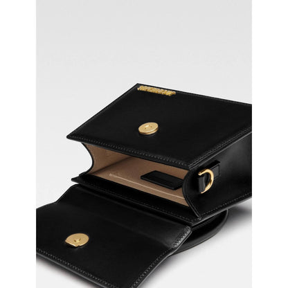 Open Jacquemus Le Chiquito Moyen Black Bag showing gold hardware and inside pocket with removable shoulder strap.