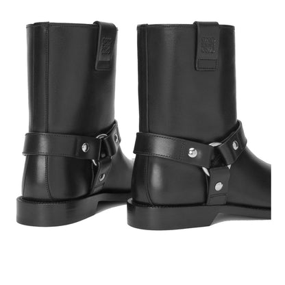 Loewe Black Calfskin Ankle Boots with hardware details, round toe, and embossed Anagram. Made in Italy, 30mm heel height.