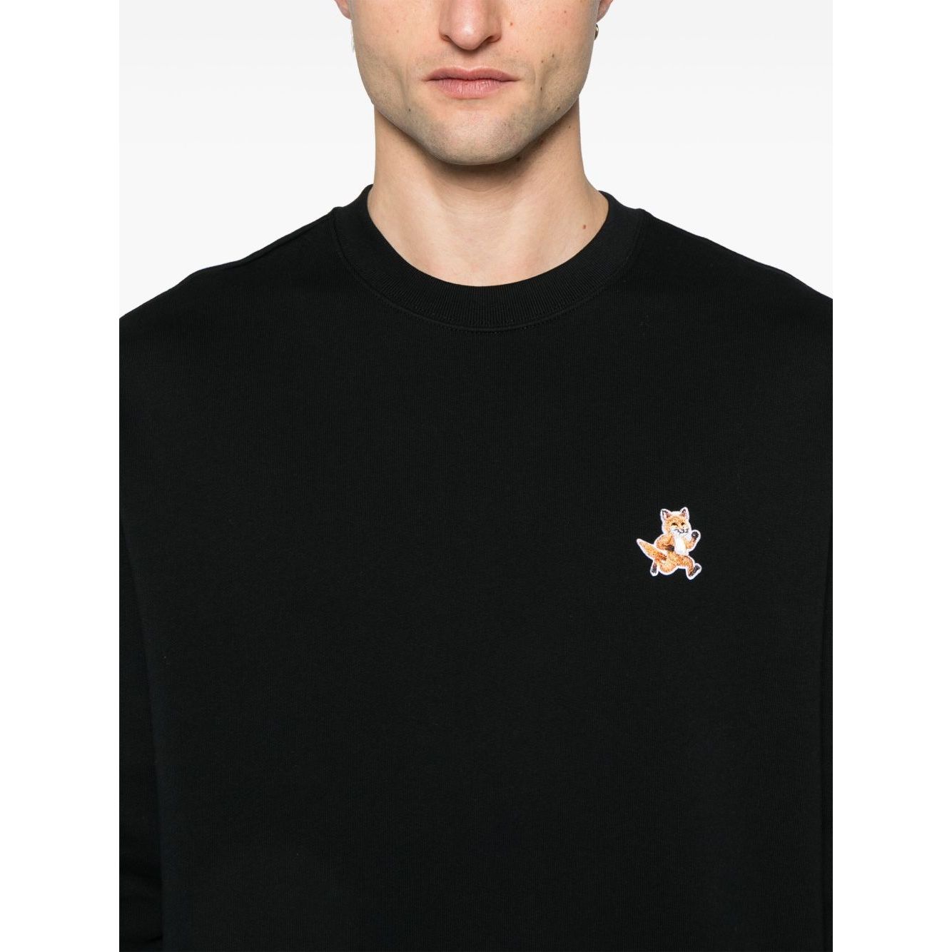 Maison Kitsuné Maison Kitsune speedy fox patch comfort sweatshirt with black ribbed cuffs and hem, showcasing the signature fox motif.