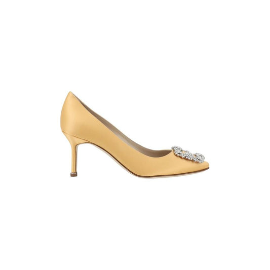 Manolo Blahnik Hangisi PumpsSilk Satin Hangisi Pumps by Manolo Blahnik, almond toe, iconic Swarovski crystal buckle appliqué on front, leather stiletto heel, logo-embossed insole.