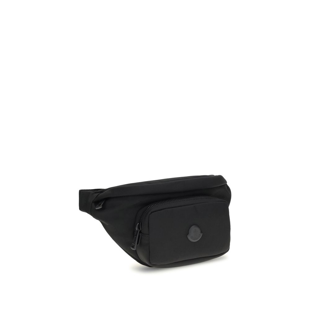Moncler Black Nylon Clutch Bag with leather trim, adjustable belt, zippered pockets, and metal logo for a refined look.