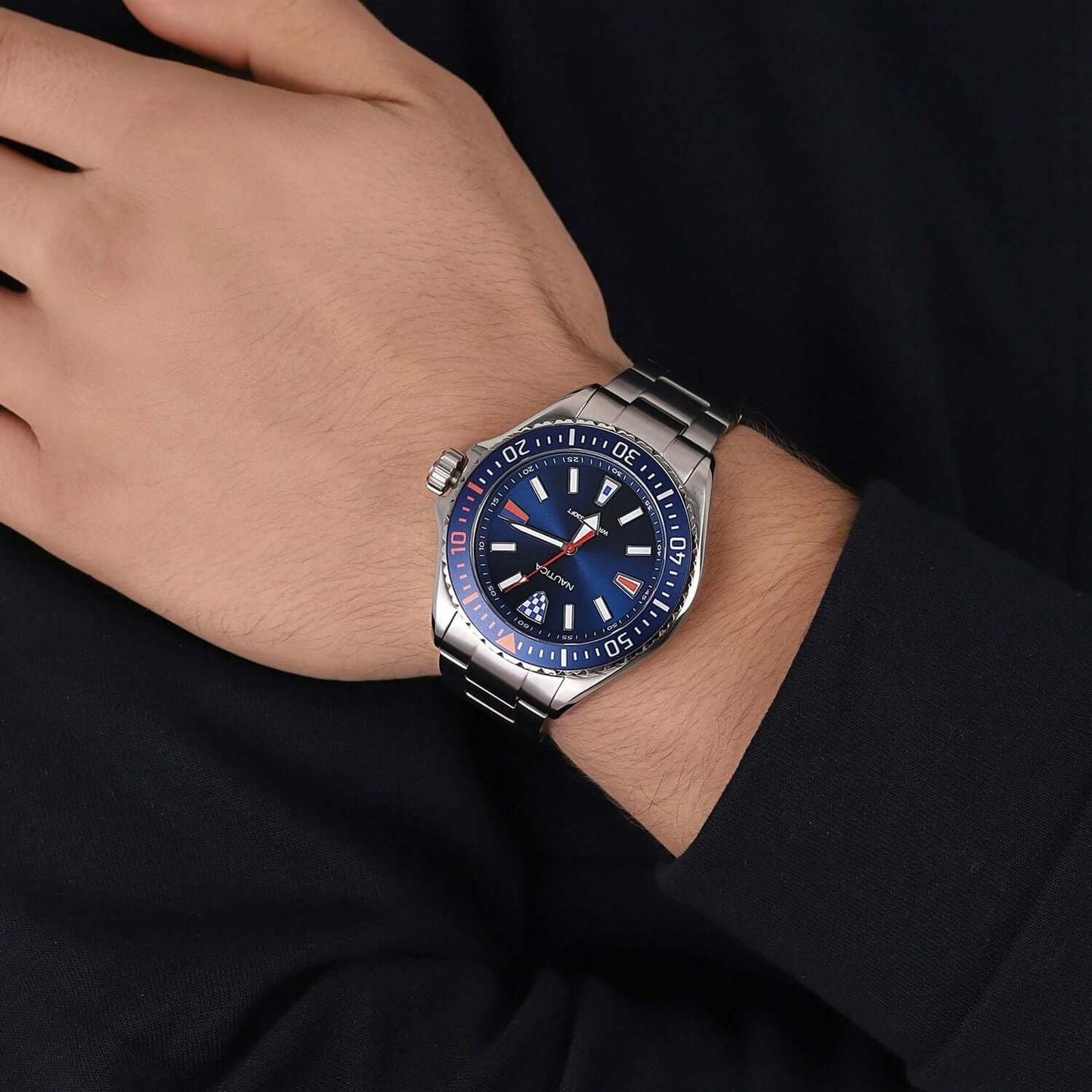 Gent wearing NAUTICA Mod. NAPCPS904 quartz analog watch, 46mm case, multifunction, water-resistant 5 ATM, in official box.