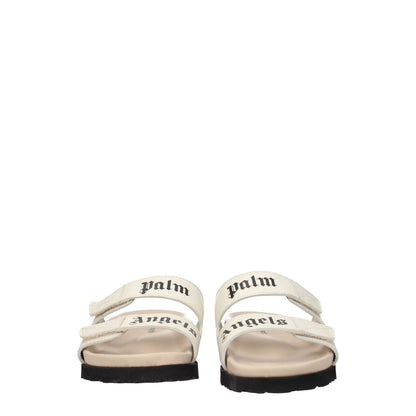 Palm Angels Beige Leather Flat Sandals with front logo straps, strap closure, rubber sole, open toe design, low flat heel.