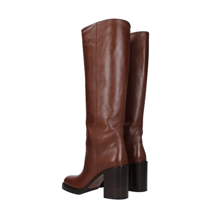 Prada Brown Leather High Heel Boots with 9 cm heel and round toe, showcasing casual style in cognac leather