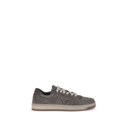 Prada Gray Calf Leather Bos Taurus Low Top Sneakers with suede texture and lace-up closure, featuring a stylish rounded toe and flat sole.