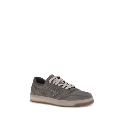 Prada Gray Calf Leather Bos Taurus Low Top Sneakers in suede material with lace-up top closure and flat sole, showcasing discreet elegance.