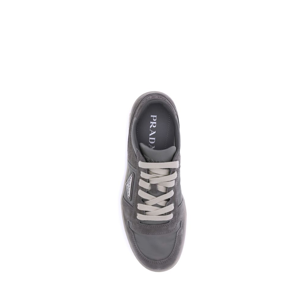 Top view of Prada Gray Calf Leather Bos Taurus Low Top Sneakers with lace-up closure and rounded toe in suede leather.