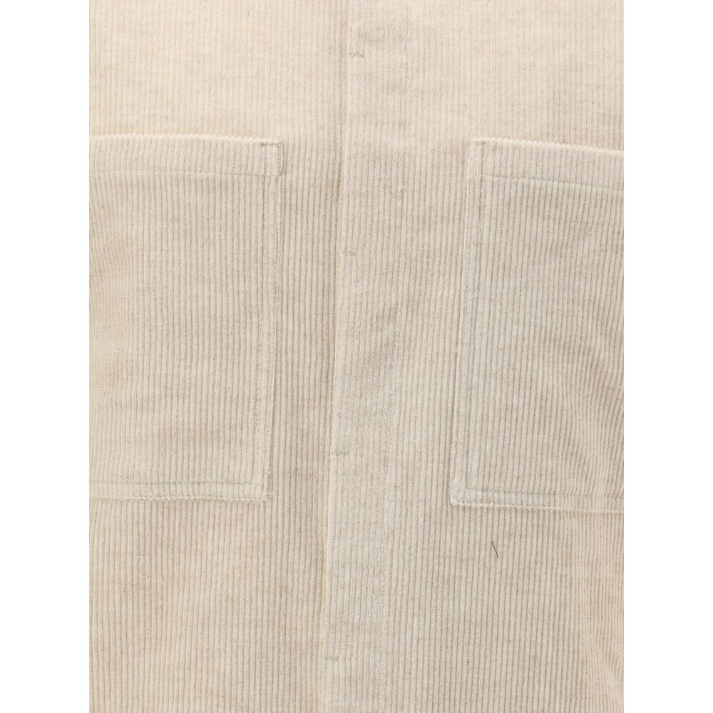 Close-up of patch pockets on Rick Owens Cream Cotton Shirt with corduroy texture, classic collar, and front button closure for AW25 season.
