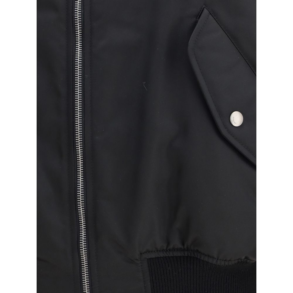 Close-up of Saint Laurent Black Polyamide Bomber jacket with zipper and pocket details