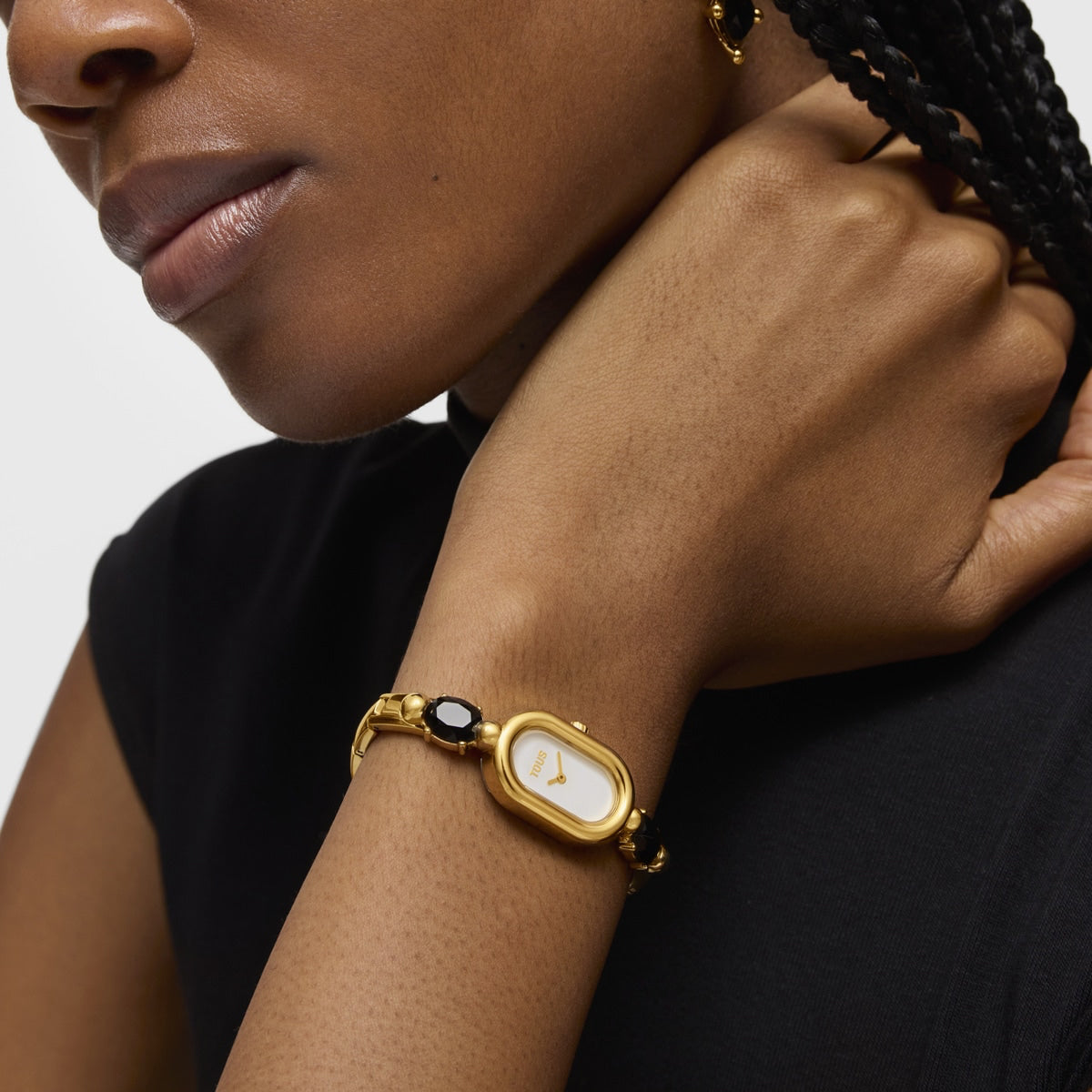 TOUS WATCHES Mod. 3000138600 on woman's wrist, gold watch with elegant design, close-up