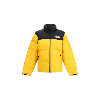 The North Face Yellow Polyamide Shell Jacket with high collar, removable hood, and contrasting logo in yellow-and-black colorway.