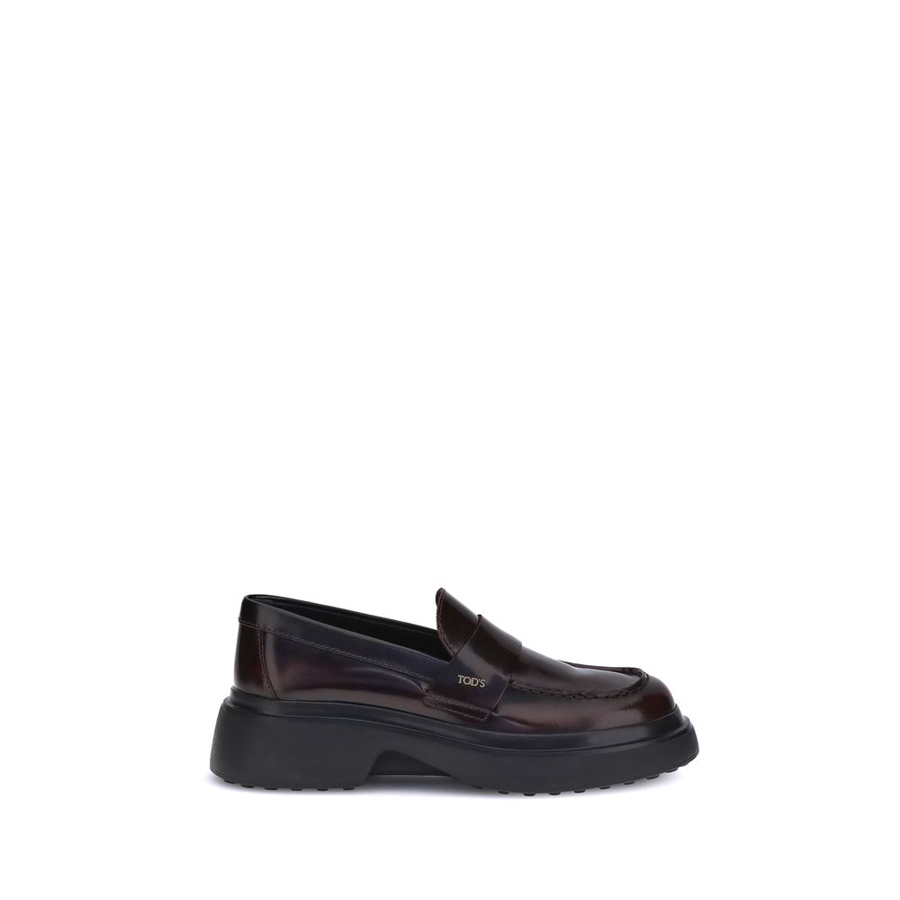 Alt Tag: Tod's Brown Rubber Platform Loafers with patent leather and rounded toe design.