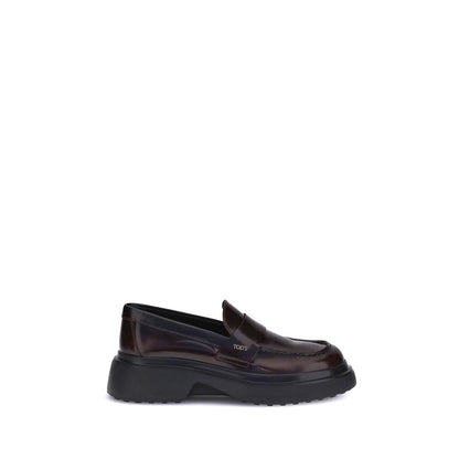 Alt Tag: Tod's Brown Rubber Platform Loafers with patent leather and rounded toe design.