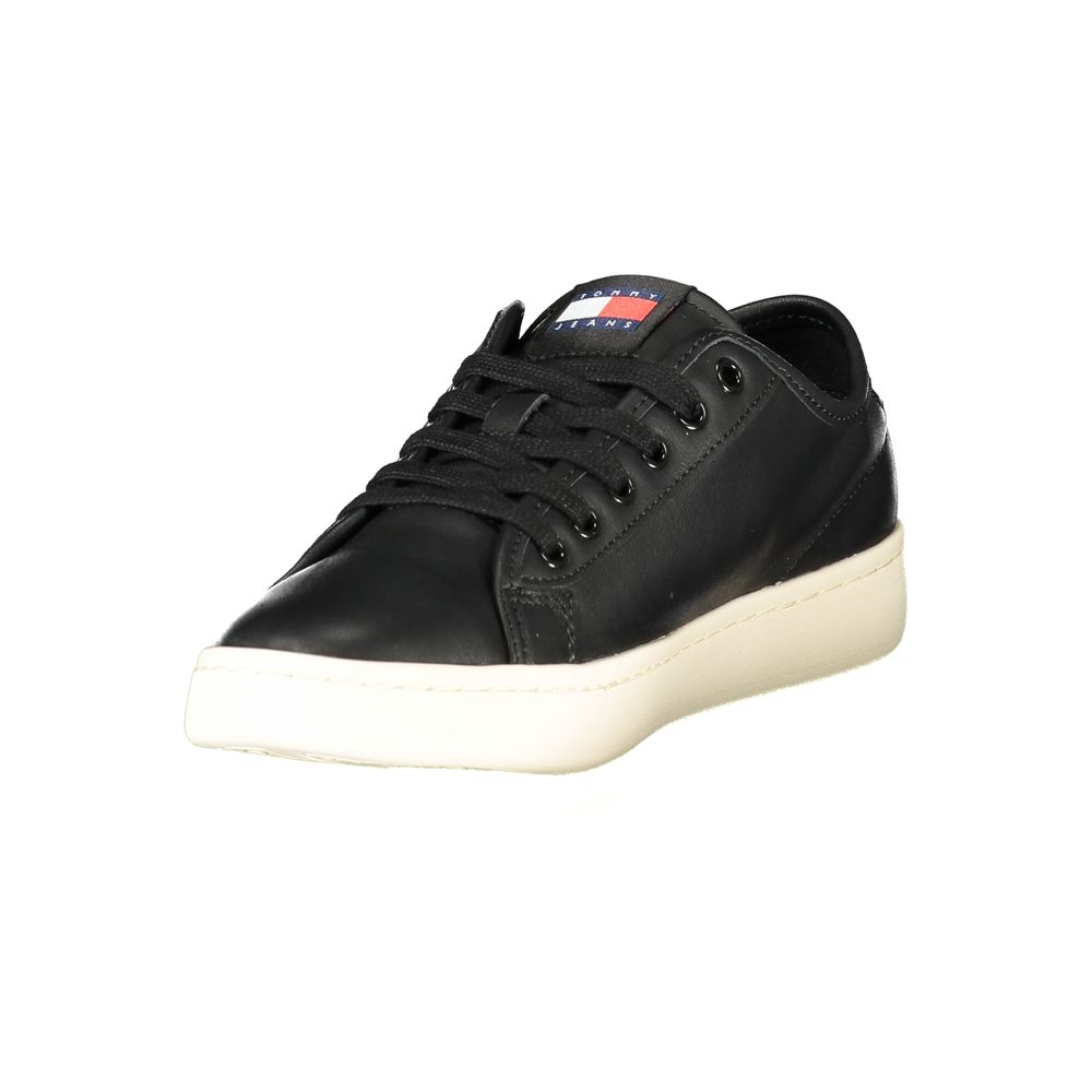 Tommy Hilfiger Black Leather Women's Sneaker with sleek design and iconic logo, removable footbed for comfort, perfect for modern chic style.