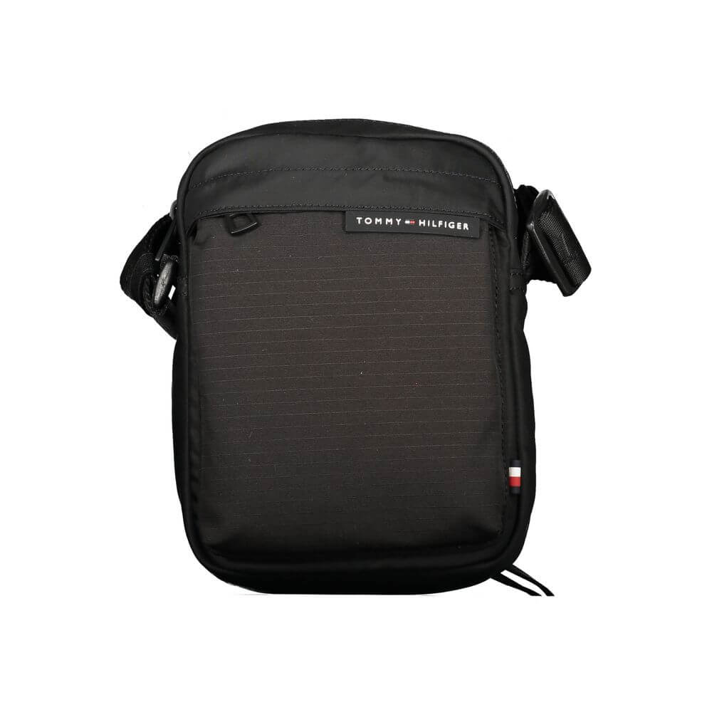 Front view with bag zipped and handles upright.