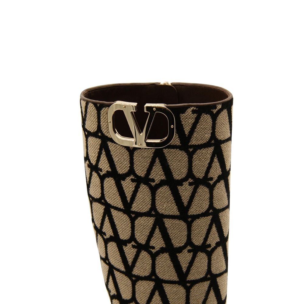 Valentino Garavani Beige Canvas Boots with Vlogo detail in canvas fabric and side zip, featuring a 2 cm heel, made in Italy.