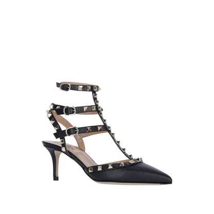 Valentino Garavani Black Leather Mid Heel Pumps with pointed toe and ankle side buckle fastening, featuring a textured leather design.