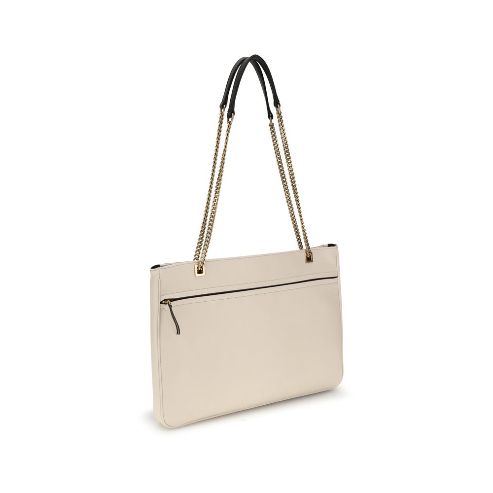 Valentino Garavani Cream Calf Leather Bos Taurus Shoulder Bag with chain handle, VLogo, and back slit pocket with zipper closure.