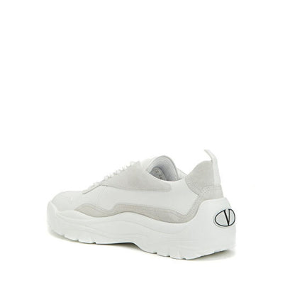 Back view of Valentino Garavani White Leather Low Top Sneakers with contrast logo and suede detail.