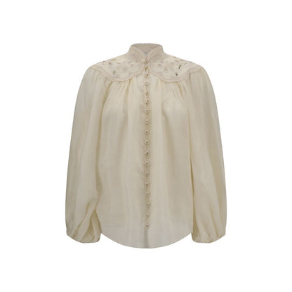 Zimmermann Cream Ramie Blouse with lace high neck and puff sleeves.