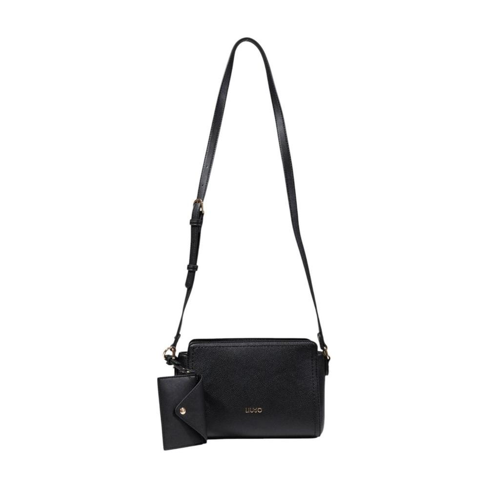Front view with bag zipped and handles upright.