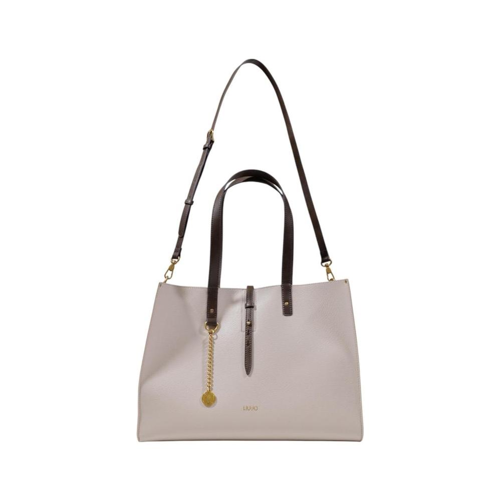 Front view with bag zipped and handles upright.